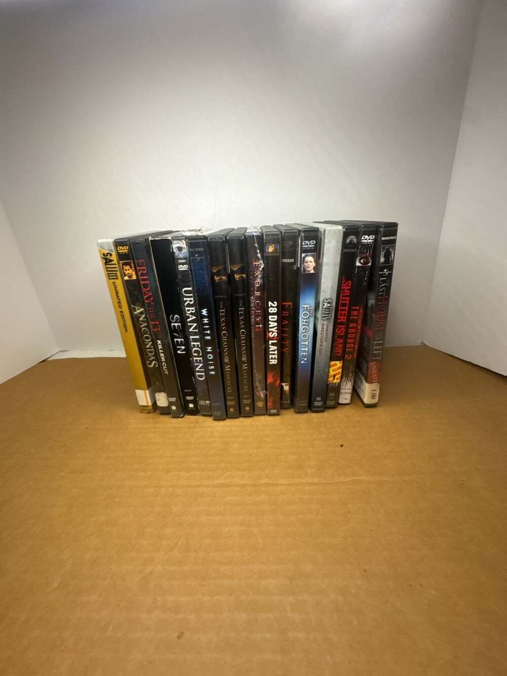 Lot of 16 Horror & Thriller DVDs Including Texas Chainsaw Massacre, Saw, & Seven